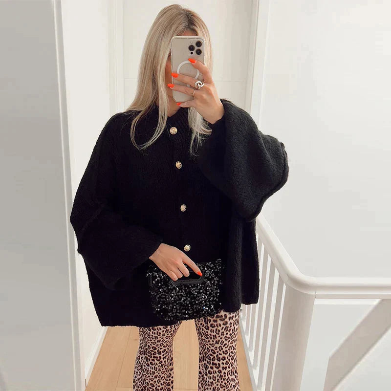 Women's oversized loose-fit cardigan with luxurious golden button details for everyday chic style