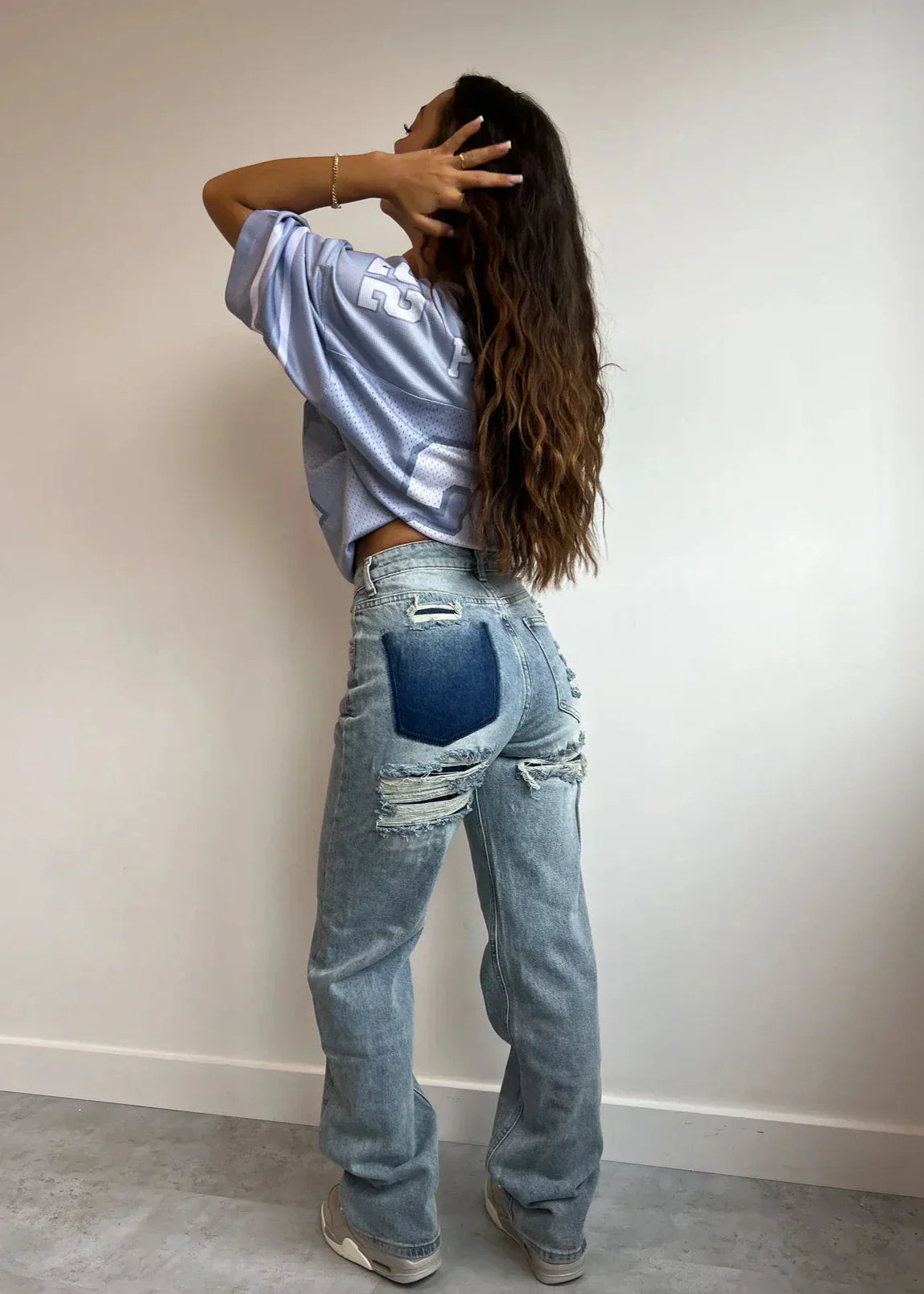 Blue high-rise relaxed straight-leg denim pants with flattering everyday casual fit